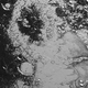 Imagen para el artículo titulado La misteriosa diferencia entre las zonas claras y oscuras de Plutón